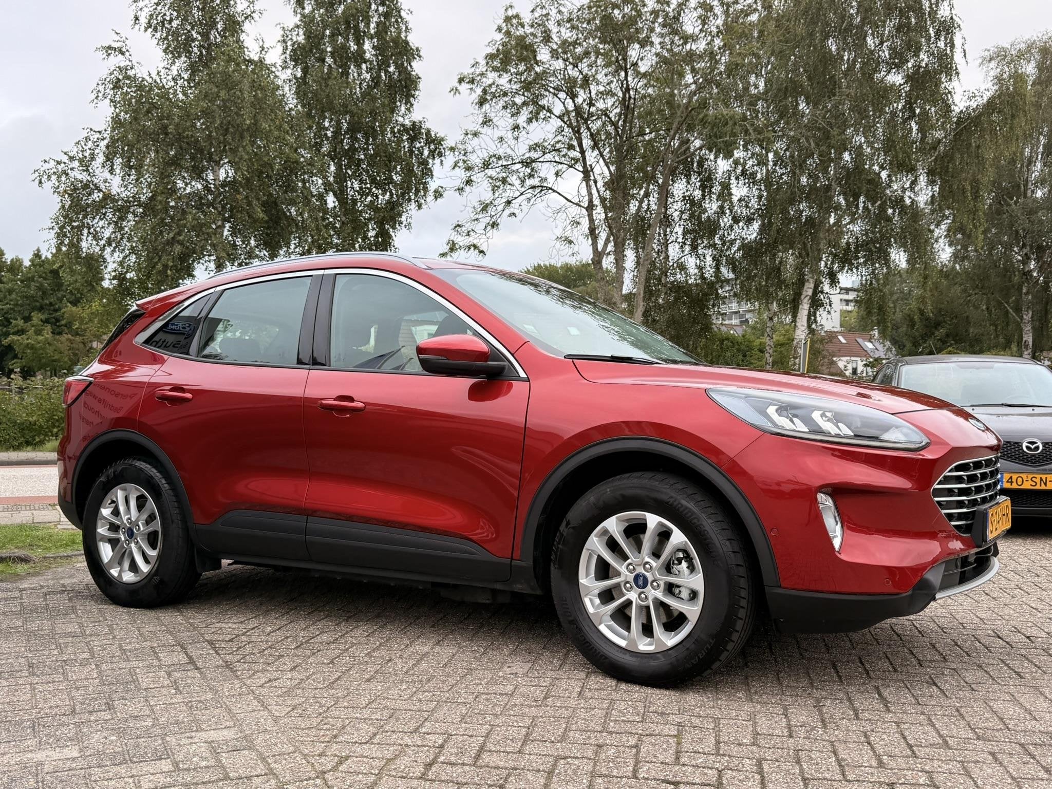 Ford Kuga 2.5 PHEV Titanium 225pk | Wegklapbare Trekhaak | A, Gebruikt, 4 cilinders, Bedrijf, Hybride Elektrisch/Benzine