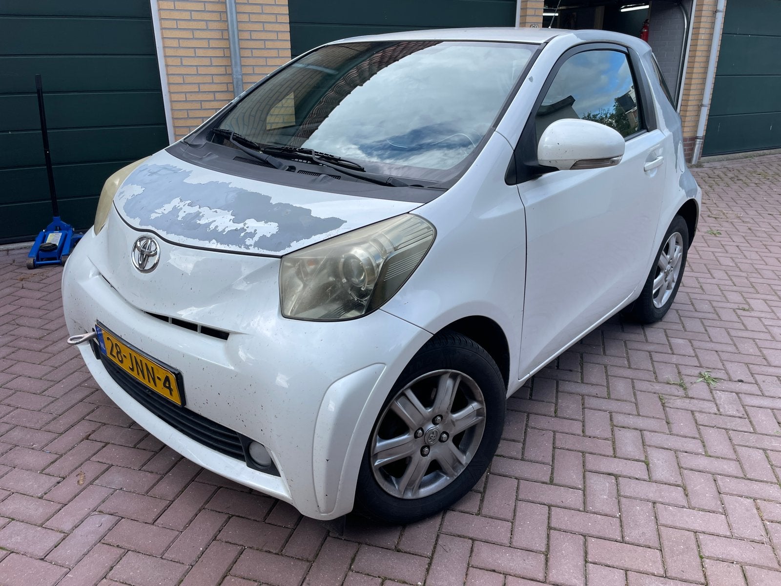 Toyota iQ 1.0 | Leder | Cruise | Stoelverwarming | Defect, 4 stoelen, Bruin, Handgeschakeld, 3 cilinders