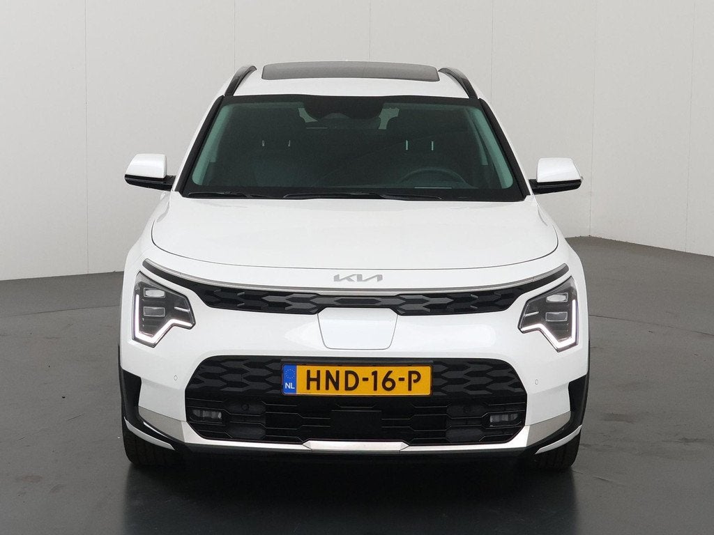 Kia Niro EV Plus 64.8 kWh | Schuif / Kanteldak | Stoel/Stuur, Auto's, Kia, Gebruikt, 750 kg, 1657 kg, Wit