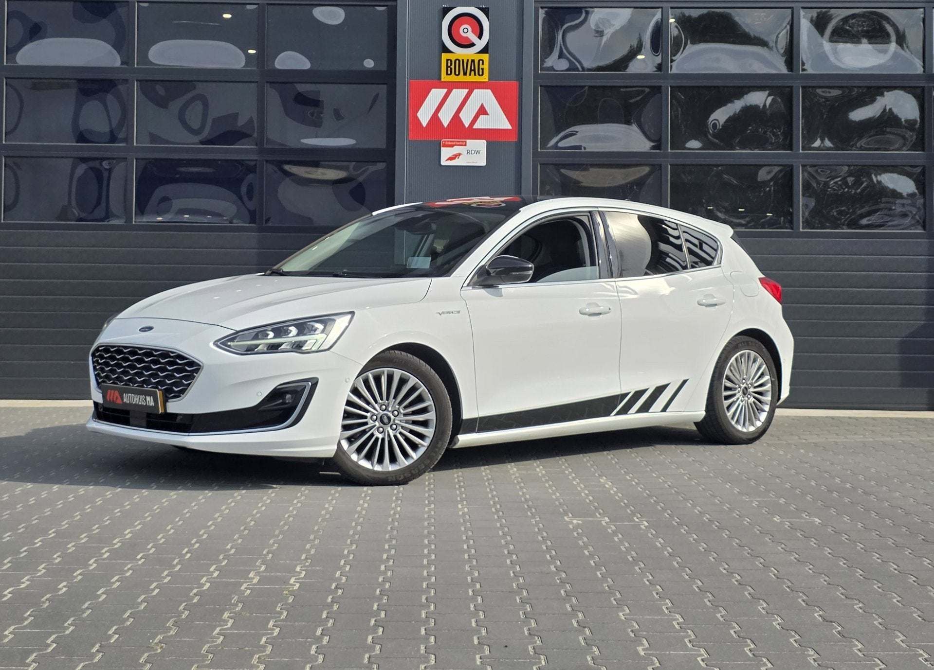 Ford Focus 1.5 EcoBoost Vignale | PANO | LEDER | TREKHAAK |, Auto's, Ford, 1304 kg, Gebruikt, Wit, Leder