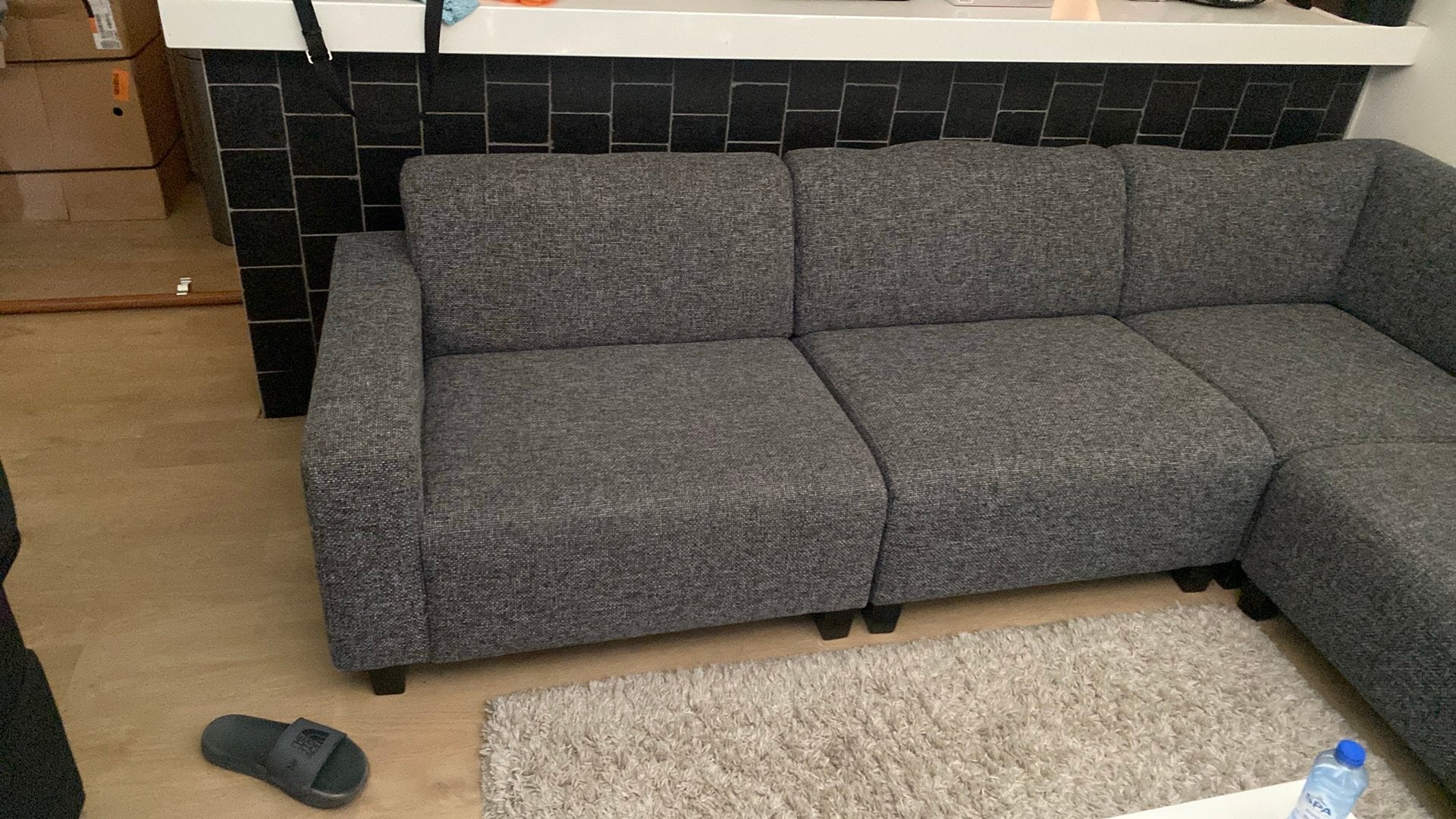 Te koop aangeboden: een antracietgrijze hoekbank/zithoek., Ophalen, Zo goed als nieuw