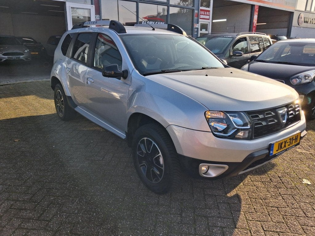 Dacia DUSTER 1.2 TCe 4x2 Ambiance CAMERA-NAVI-CRUISE, Auto's, Dacia, Voorwielaandrijving, Gebruikt, Euro 6, 4 cilinders