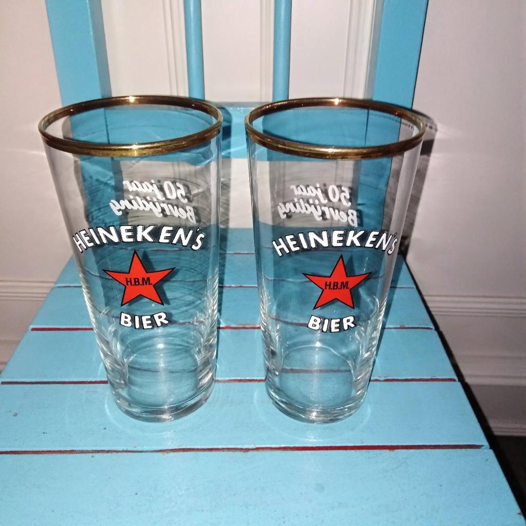 Heineken bierglazen Heineken's H.B.M 50 jaar bevrijding 2x, Ophalen, Zo goed als nieuw, Glas of Glazen, Heineken