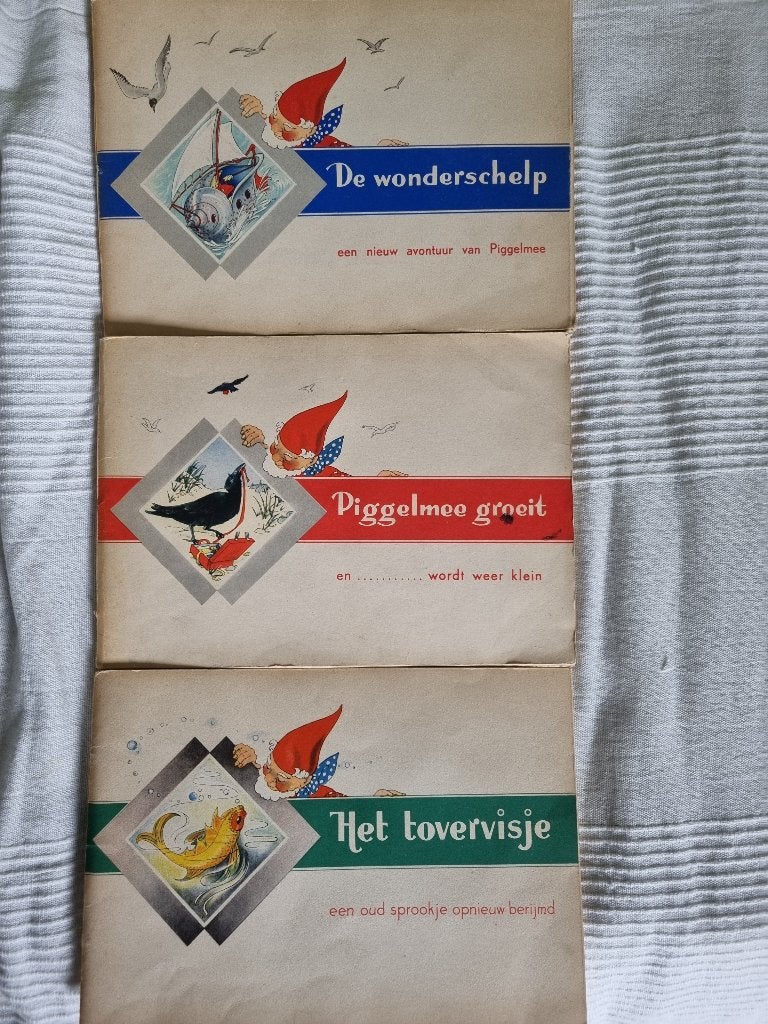 3x Album Piggelmee Originele uitg. met ingeplakte plaatjes, Ophalen of Verzenden, Gelezen