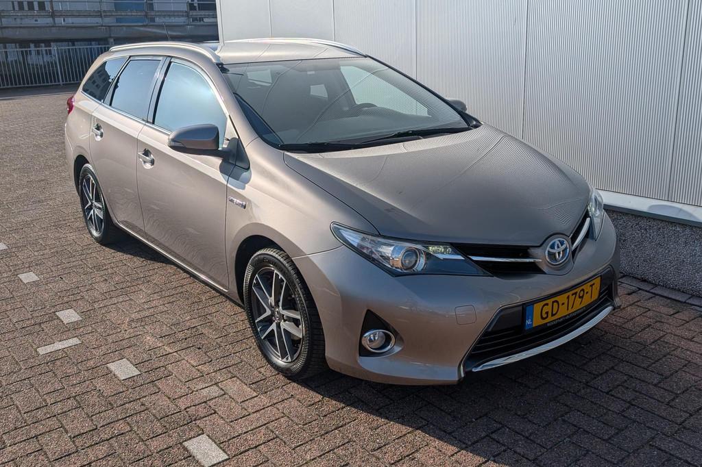 Toyota Auris Touring Sports 1.8 Hybrid Dynamic |Camera| Blue, Auto's, Toyota, Euro 5, Gebruikt, 4 cilinders, Bruin