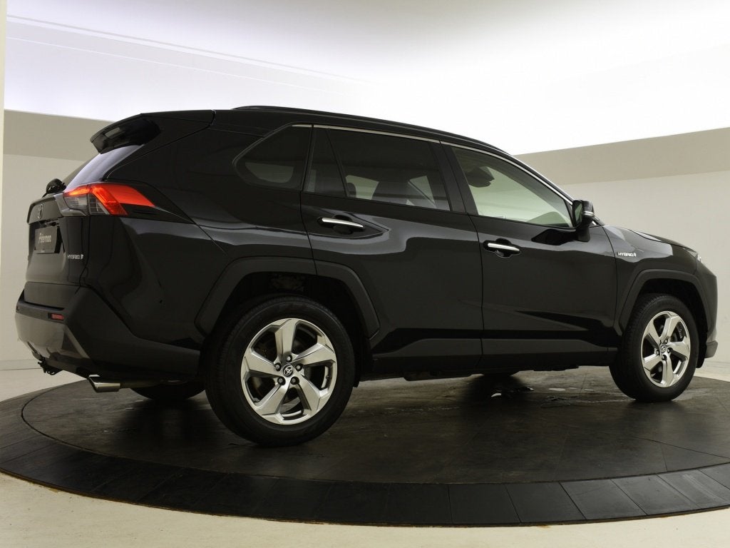 Toyota RAV4 2.5 Hybrid AWD High Comfort | Elektr. a. klep |, Auto's, Automaat, Gebruikt, 4 cilinders, Zwart