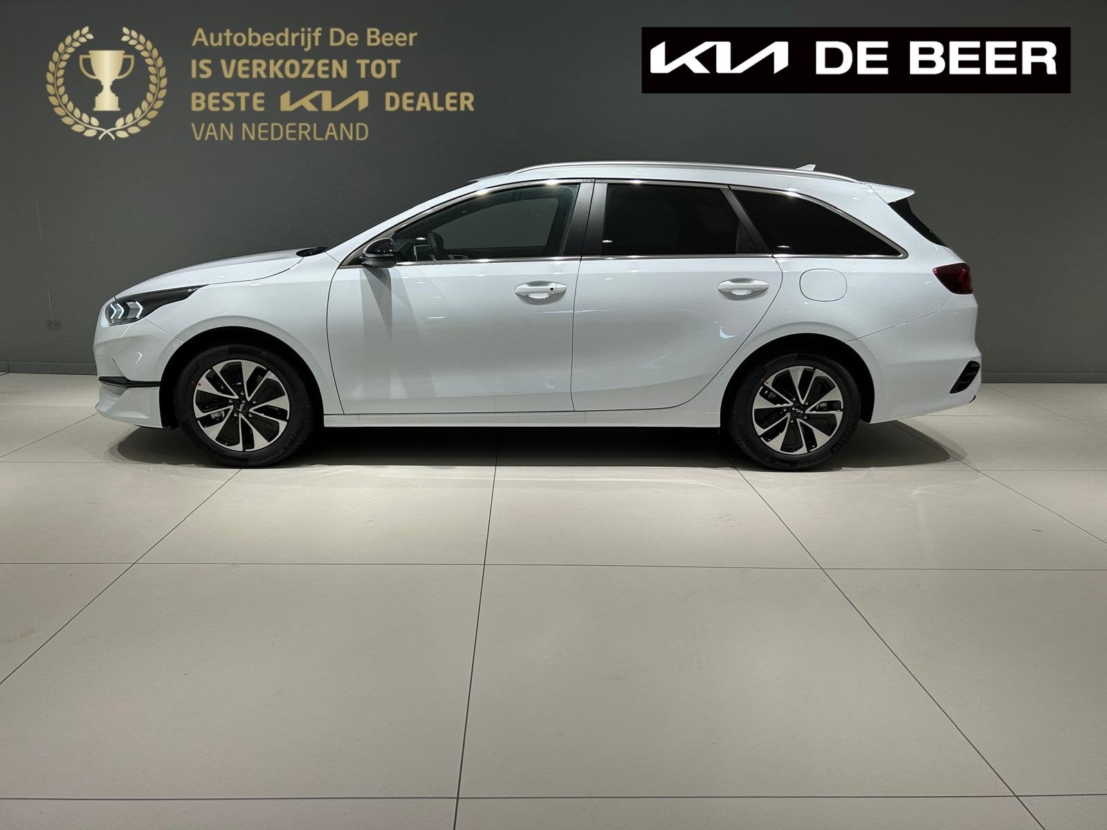 Kia Ceed Sw 1.0 T-GDi 100pk Design Edition, 12 maanden, Gebruikt, Leder en Stof, Wit