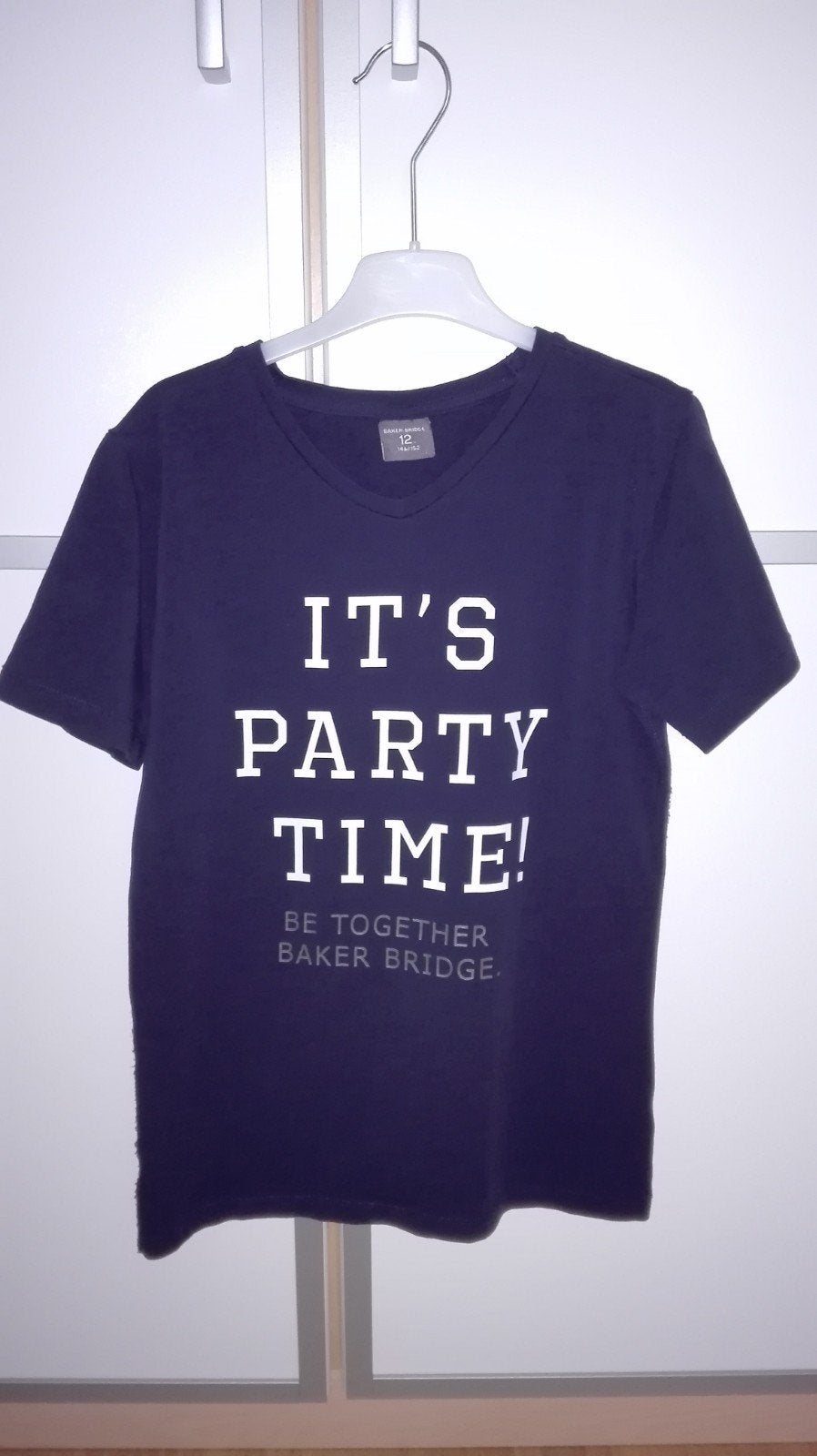 Blauw t-shirt (Baker Bridge) mt140, Nieuw, Ophalen of Verzenden, Shirt of Longsleeve, Gymp