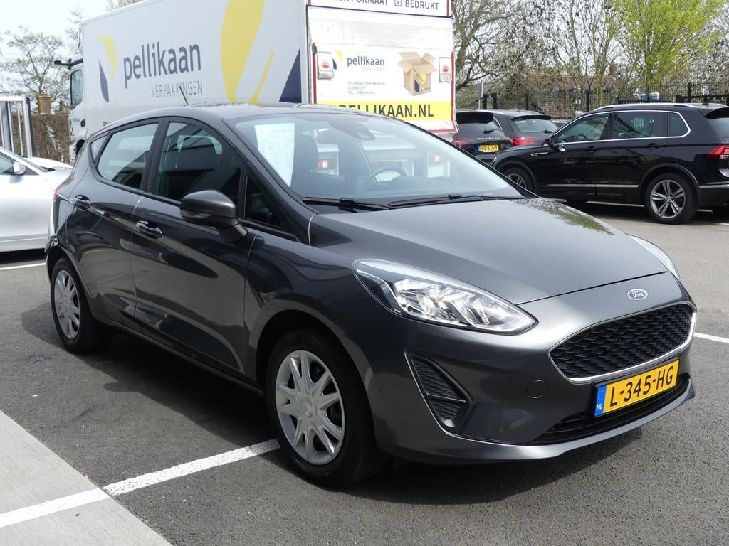 Ford Fiesta 1.1 Climate Control Cruise Control 5-Drs Dealer, Voorwielaandrijving, Stof, Lichtsensor, Bedrijf