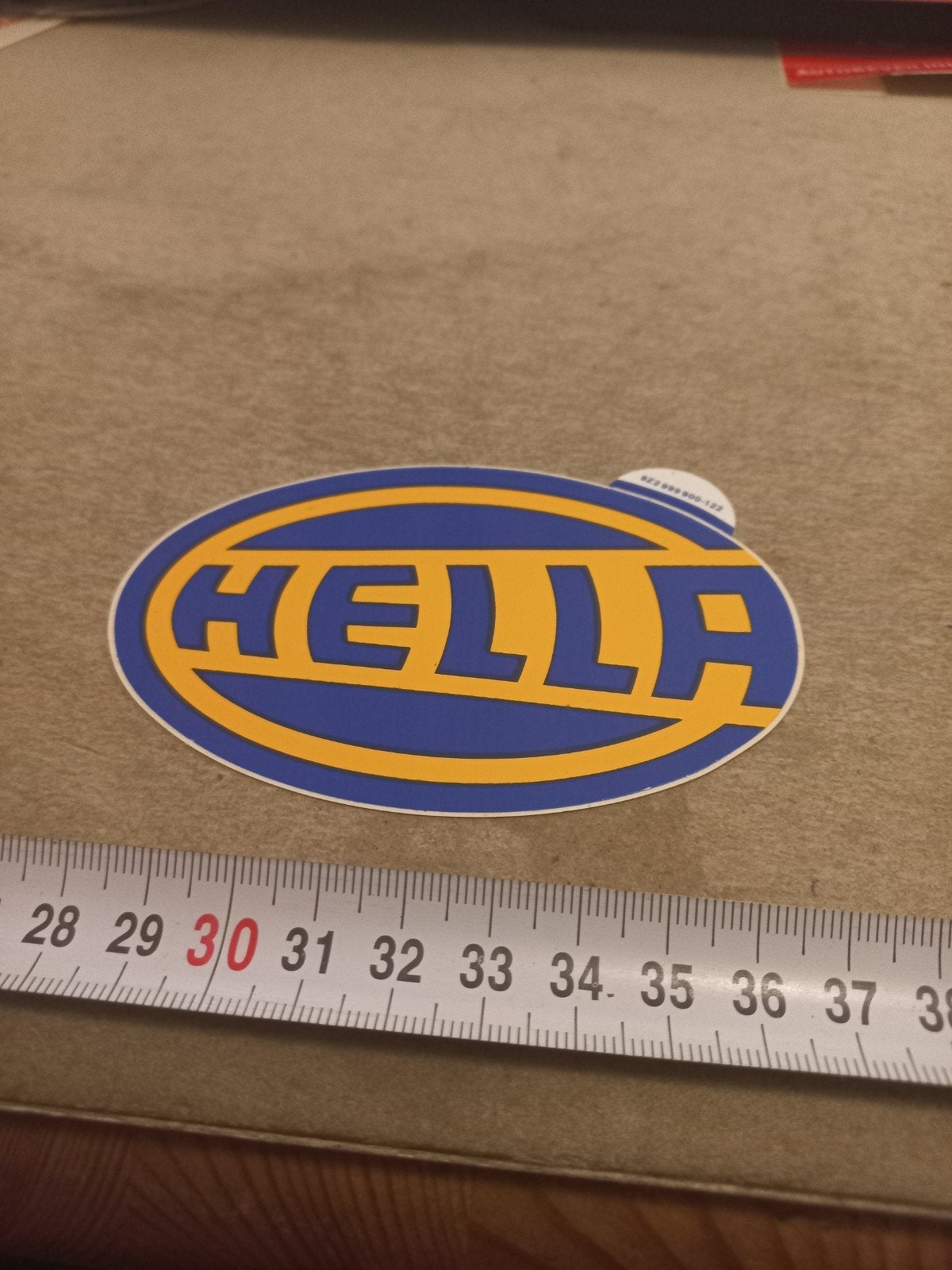Hella sticker - Blauw en geel ovaal logo, Ophalen of Verzenden