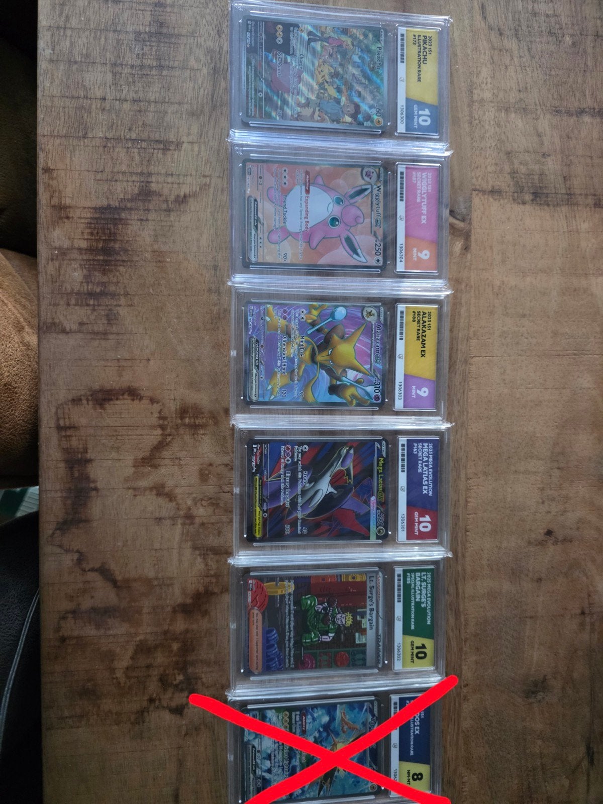 Gegradeerde Pokémon kaarten - Pikachu, Wigglytuff, Alakazam, Ophalen of Verzenden, Zo goed als nieuw, Meerdere kaarten