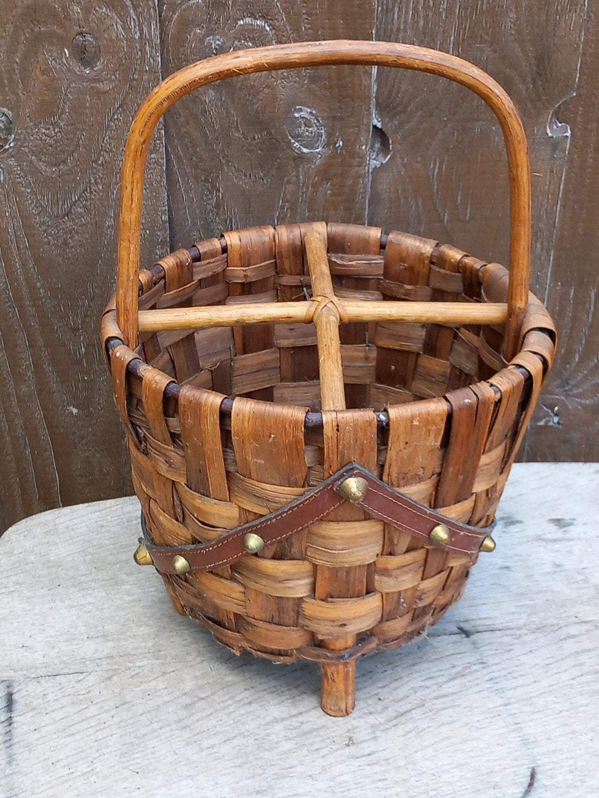 Antieke rieten mand met handvat en leren details, Ophalen of Verzenden