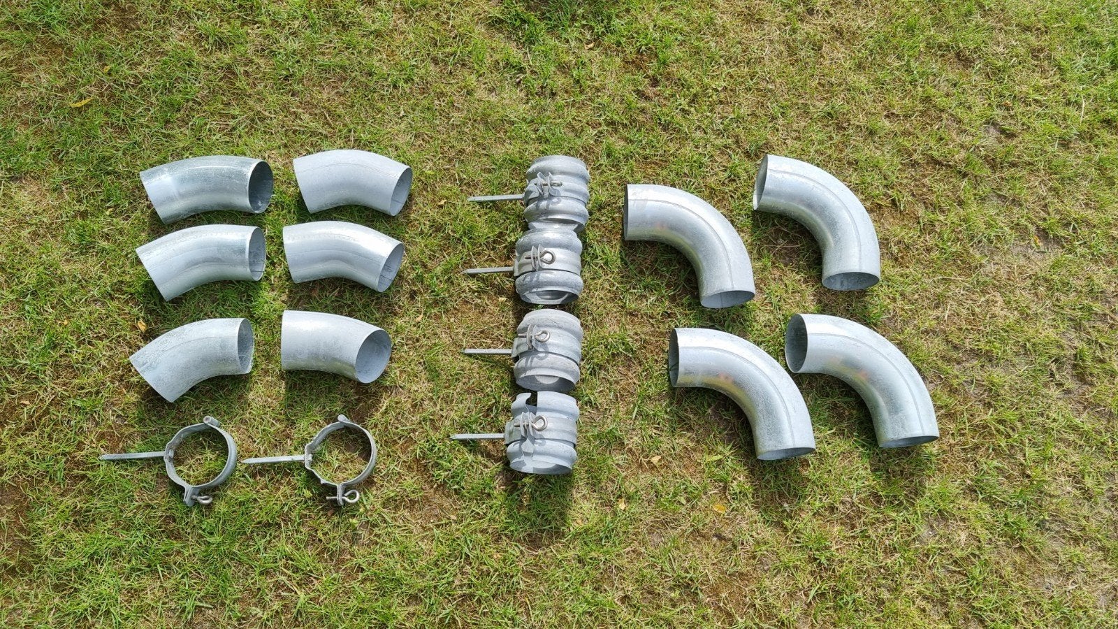 Zinken bochten en beugels voor regenpijp, Doe-het-zelf en Verbouw, Buizen en Afvoer, Bochten, Ophalen of Verzenden, Zink, Minder dan 2 meter