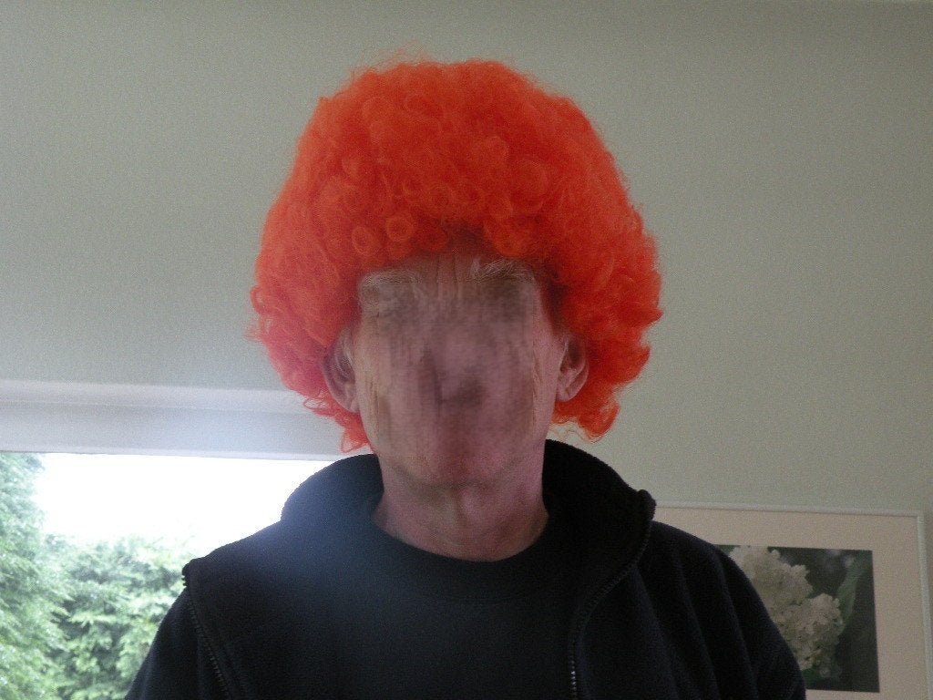 Pruik, oranje. Nieuw., Ophalen of Verzenden, Nieuw, Hoed of Pruik, Oranje of Koningsdag