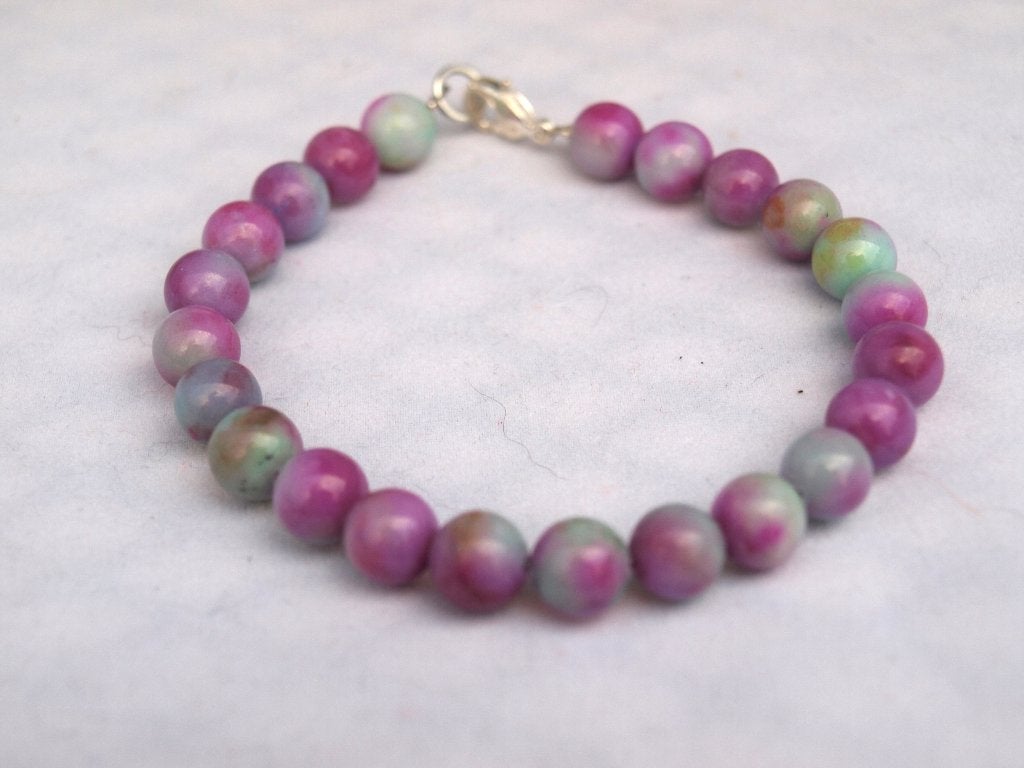 Kleurrijke kralenarmband met zilveren sluiting, Overige materialen, Paars, Nieuw, Ophalen of Verzenden