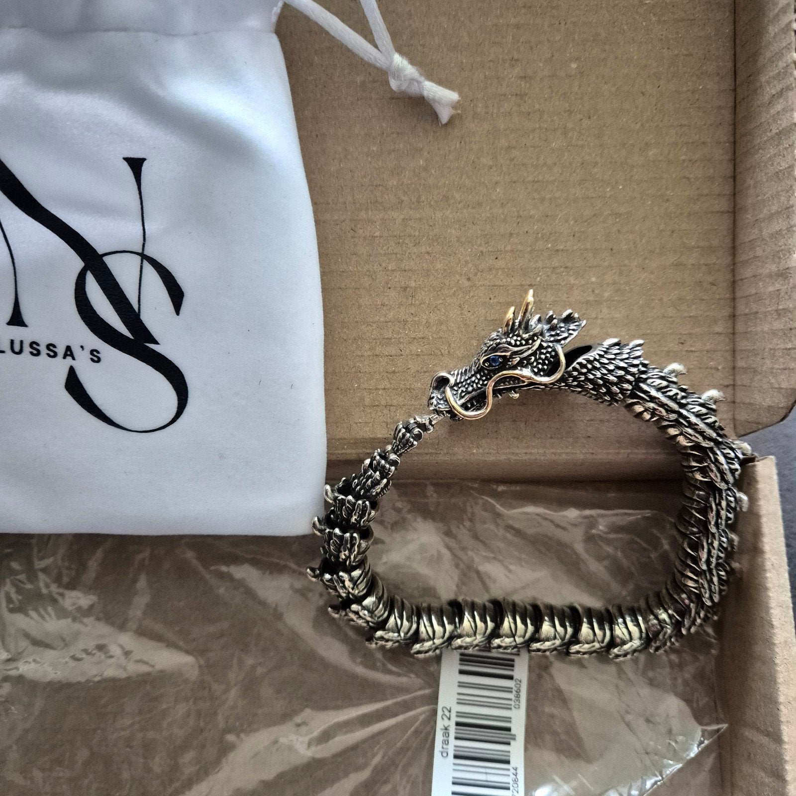 Drakenarmband - Uniek en stijlvol accessoire, Overige materialen, Nieuw, Ophalen of Verzenden, Zilver