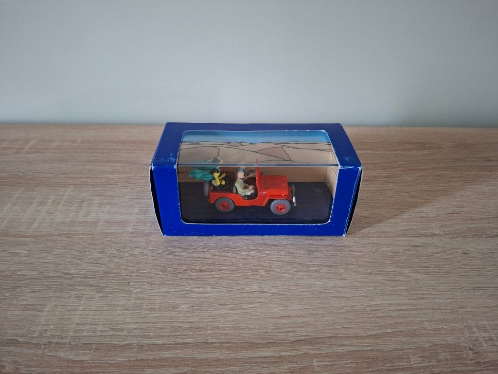 Kuifje auto 044 De rode Jeep uit Kuifje en het zwarte goud, Ophalen of Verzenden, Kuifje, Gebruikt, Beeldje of Figuurtje