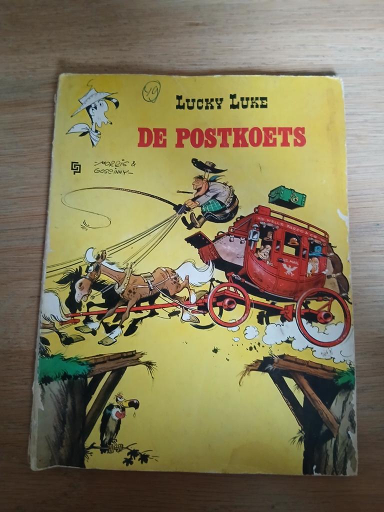 Lucky Luke - De Postkoets (Morris & Goscinny), Eén stripboek, Ophalen of Verzenden, Gelezen, Morris & Goscinny