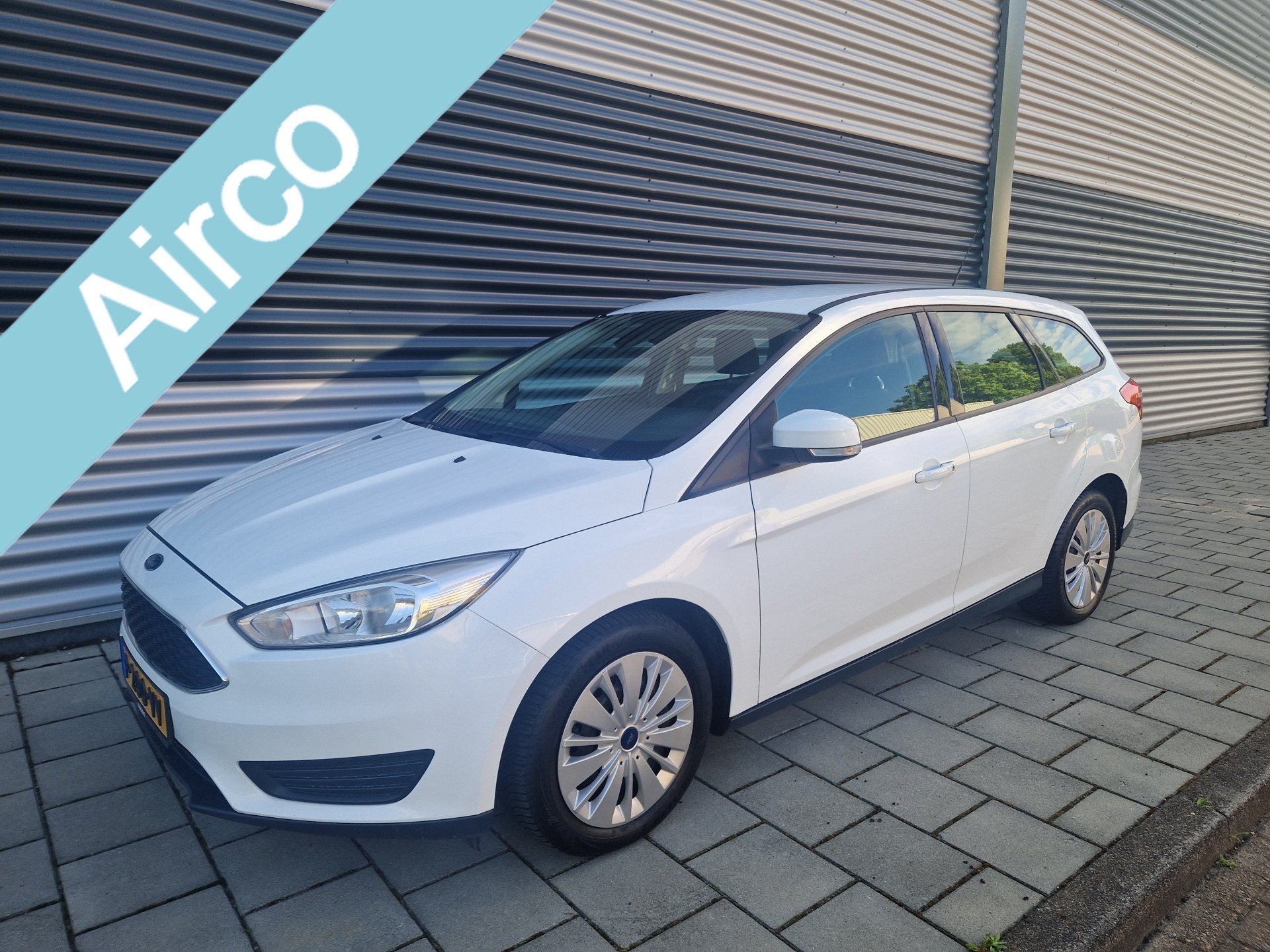 Ford Focus Wagon Nieuwe distributieriem 1.0 Trend (bj 2016), Gebruikt, Wit, Handgeschakeld, 999 cc