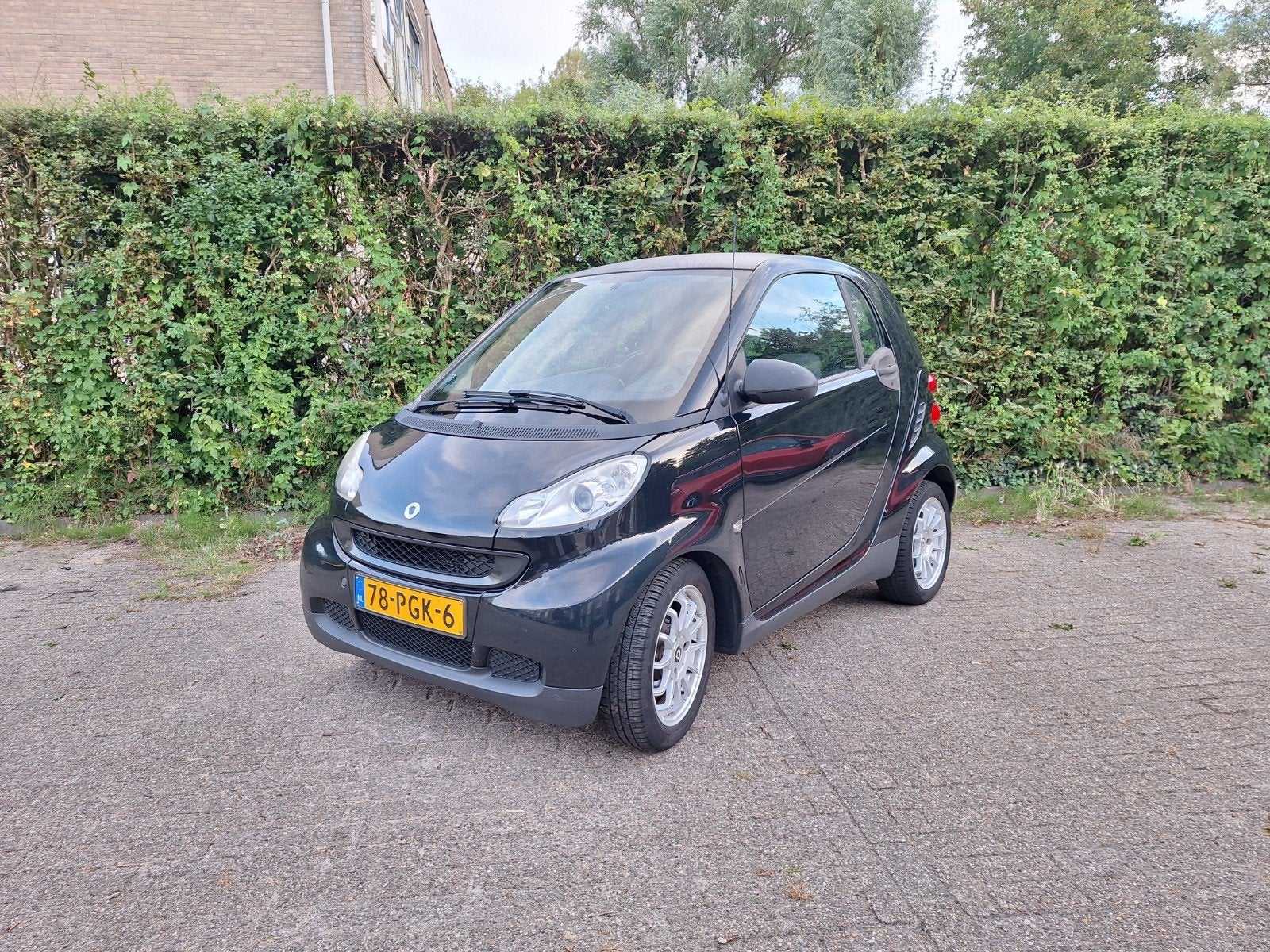Smart ForTwo 1.0 45KW Coupe MHD AUT 2011 Zwart, Auto's, Smart, Automaat, Achterwielaandrijving, 18 €/maand, 61 pk