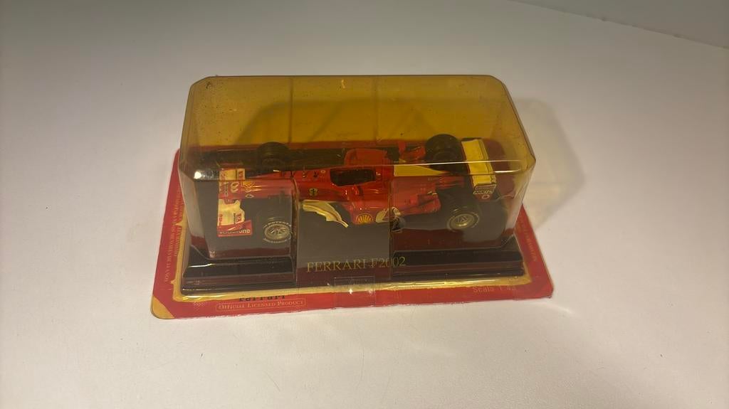 F1 ferrari f2002 atlas 1.43, Hobby en Vrije tijd, Modelauto's | 1:43, Overige merken, Auto, Ophalen of Verzenden, A