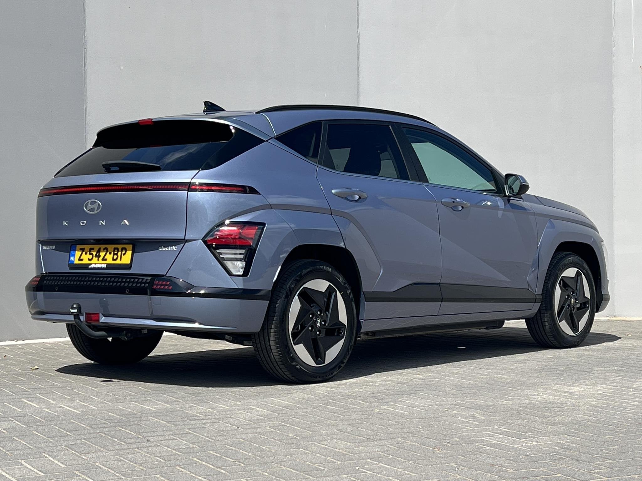 Hyundai Kona Comfort Smart 65.4 kWh / Trekhaak afneembaar 75, Gebruikt, 750 kg, Blauw, 77 €/maand