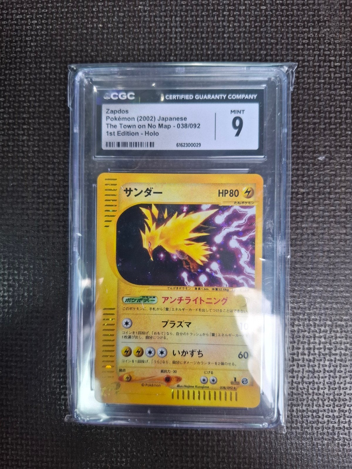 Pokemon Zapdos 1st edition #038 CGC 9, Ophalen of Verzenden, Zo goed als nieuw