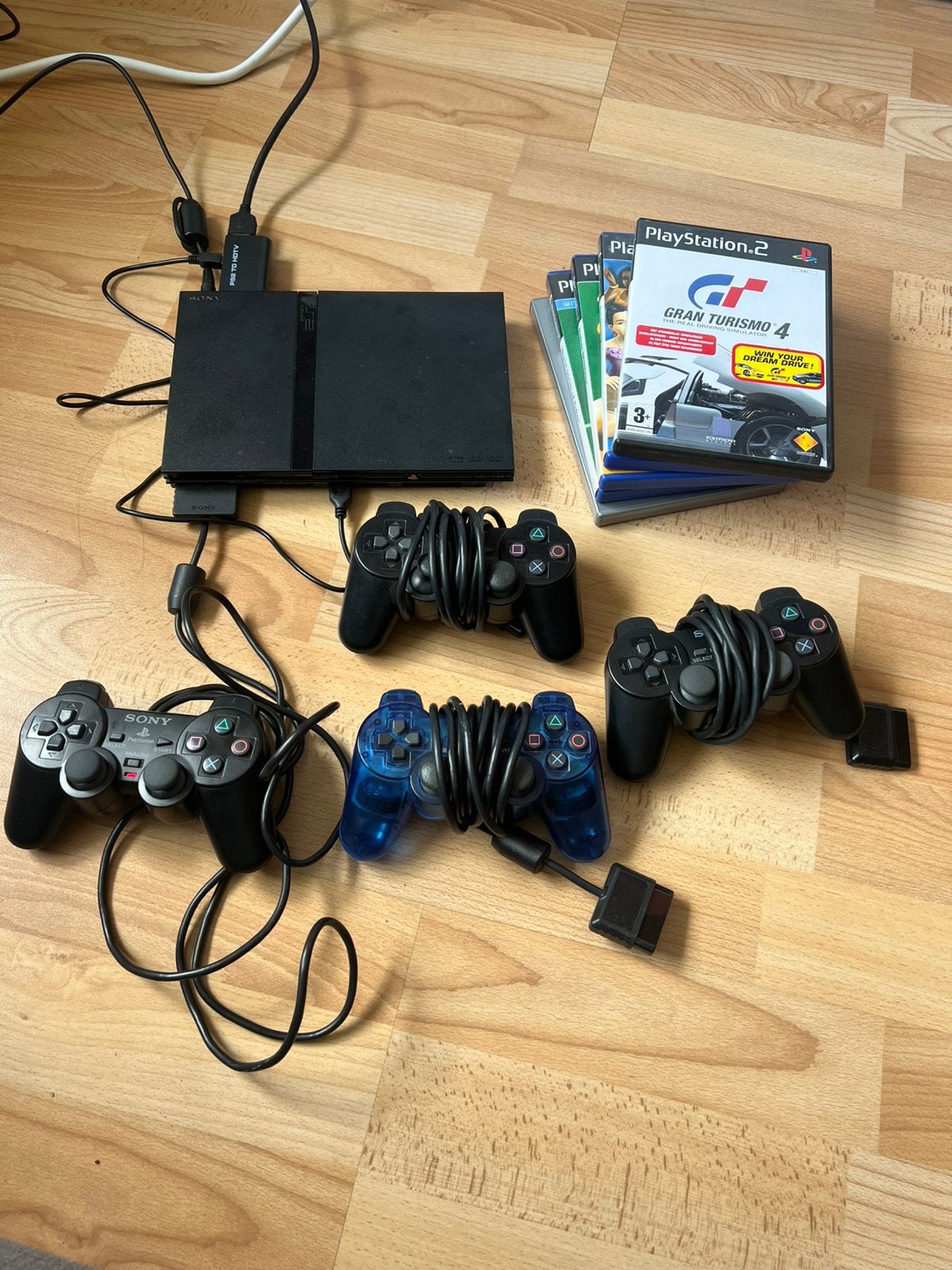 playstation 2 slim, met 4 controlers en 6 games, Zwart, Ophalen of Verzenden, Zo goed als nieuw, Met geheugenkaart