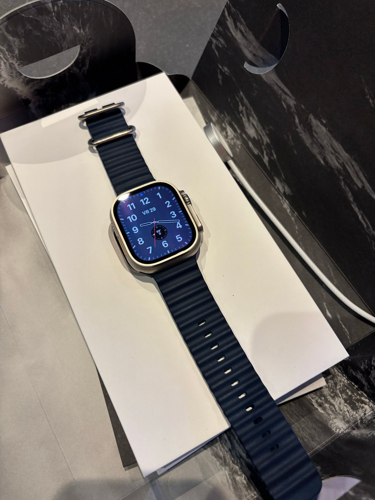 Apple Watch Ultra 2 titanium met extra bandjes, Ophalen, IOS, Zo goed als nieuw, Waterdicht