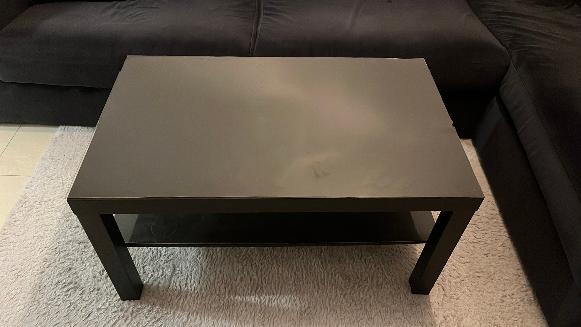 Zwarte salon/bijzettafel 90x55 cm met plastic blad, Ophalen, Gebruikt, 50 tot 100 cm, Glas