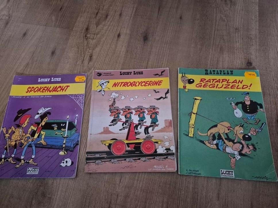 Lucky Luke & Rataplan stripboeken uit 1987 en 1992, Boeken, Gelezen, Dargaud, Ophalen of Verzenden, Meerdere stripboeken