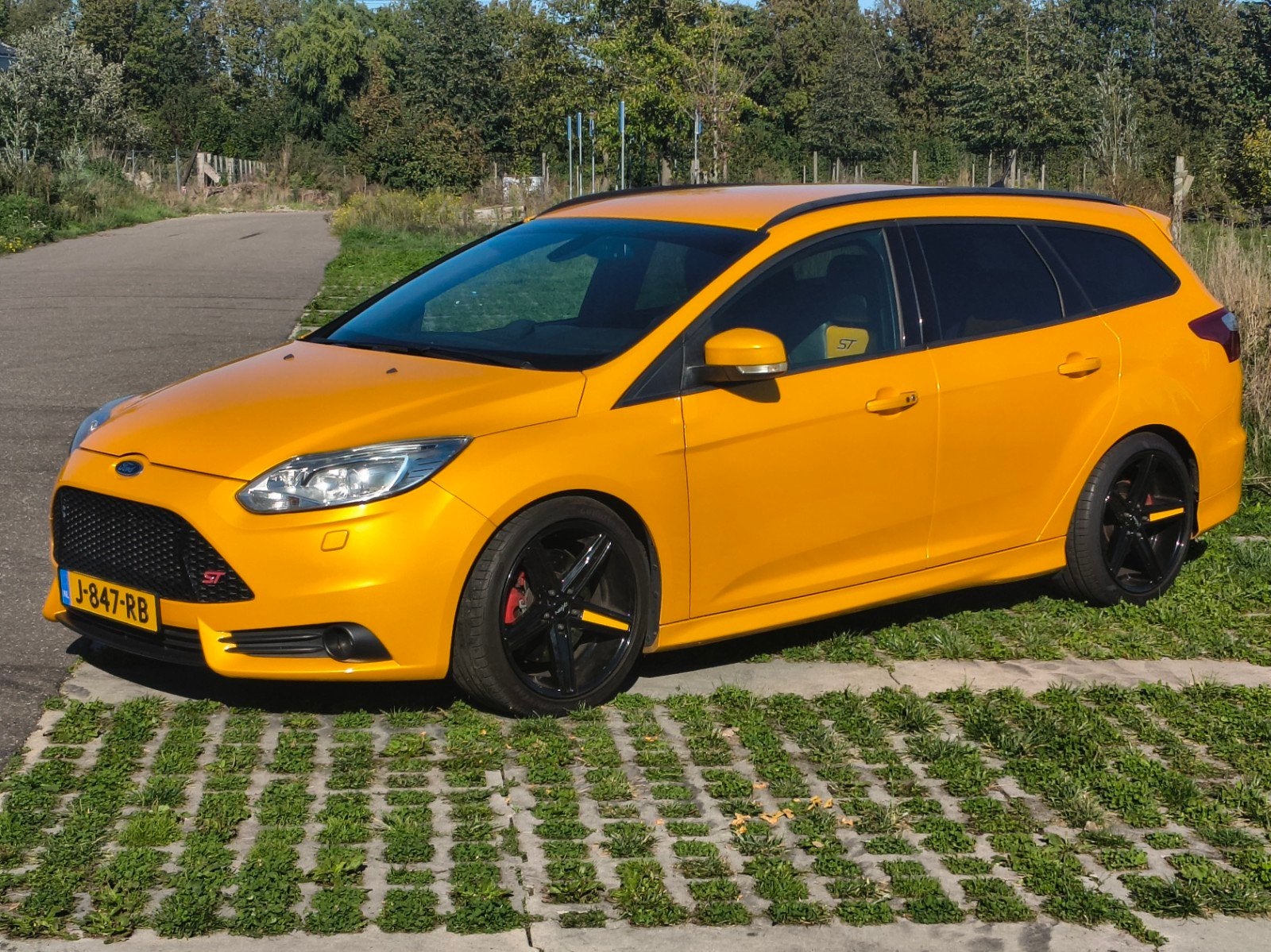 Ford Focus ST Wagon 2.0 EcoBoost 250pk| Bi-Xenon| Milltek, Euro 5, Zwart, 4 cilinders, Leder en Stof