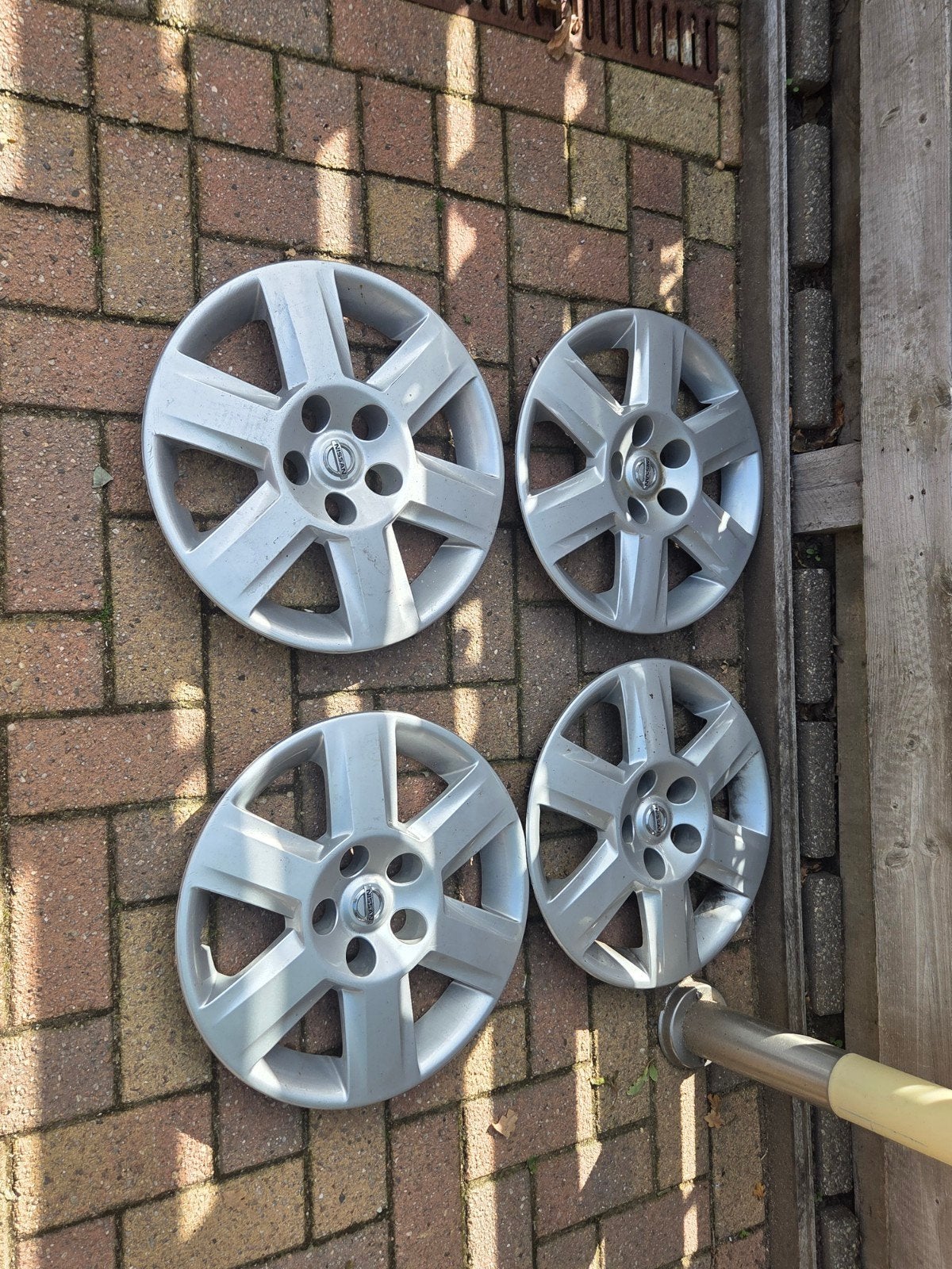 Nissan wieldoppen 16 inch, Ophalen of Verzenden, Gebruikt