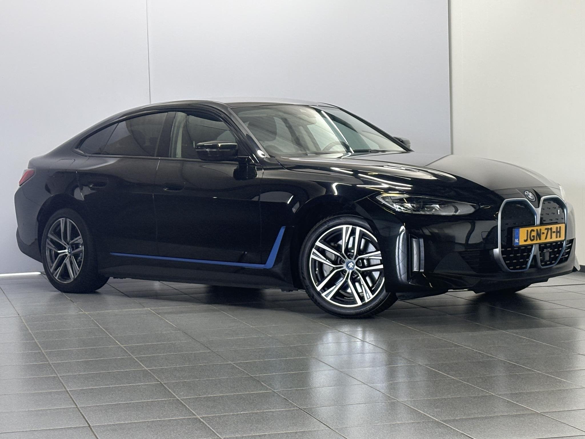 BMW i4 eDrive40 84 kWh, 12 maanden, Achterwielaandrijving, Leder en Stof, Parkeersensor