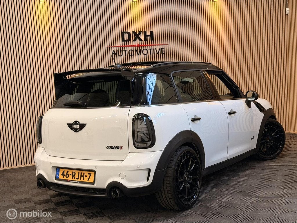 Mini Countryman 1.6 Cooper S ALL4 184pk AUT PANO H/k LEDER, Auto's, Mini, Euro 5, 1380 kg, Gebruikt, Zwart