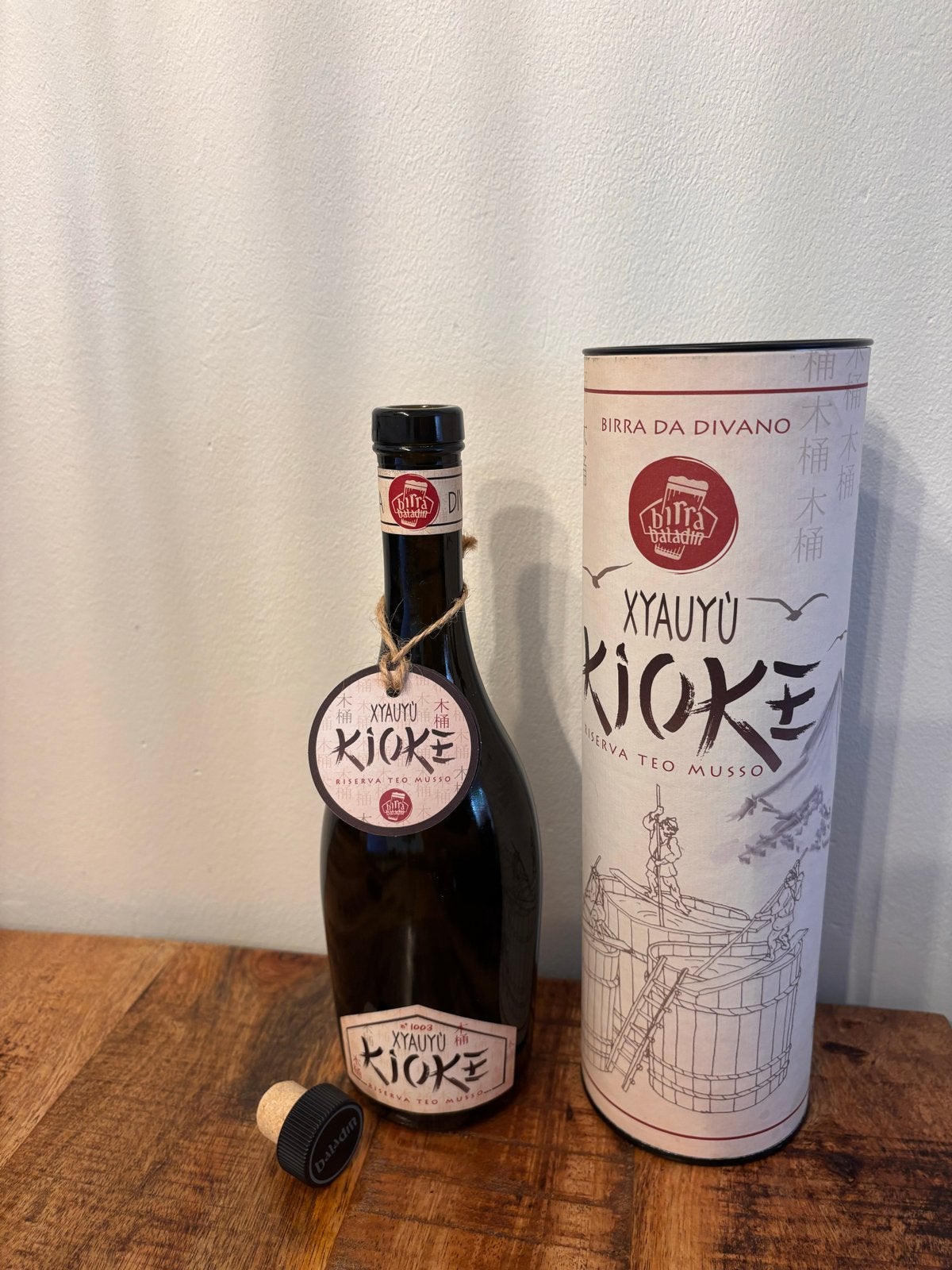 Lege bierfles Xyauyù Kioke met koker en kurkdop, Ophalen of Verzenden, Gebruikt