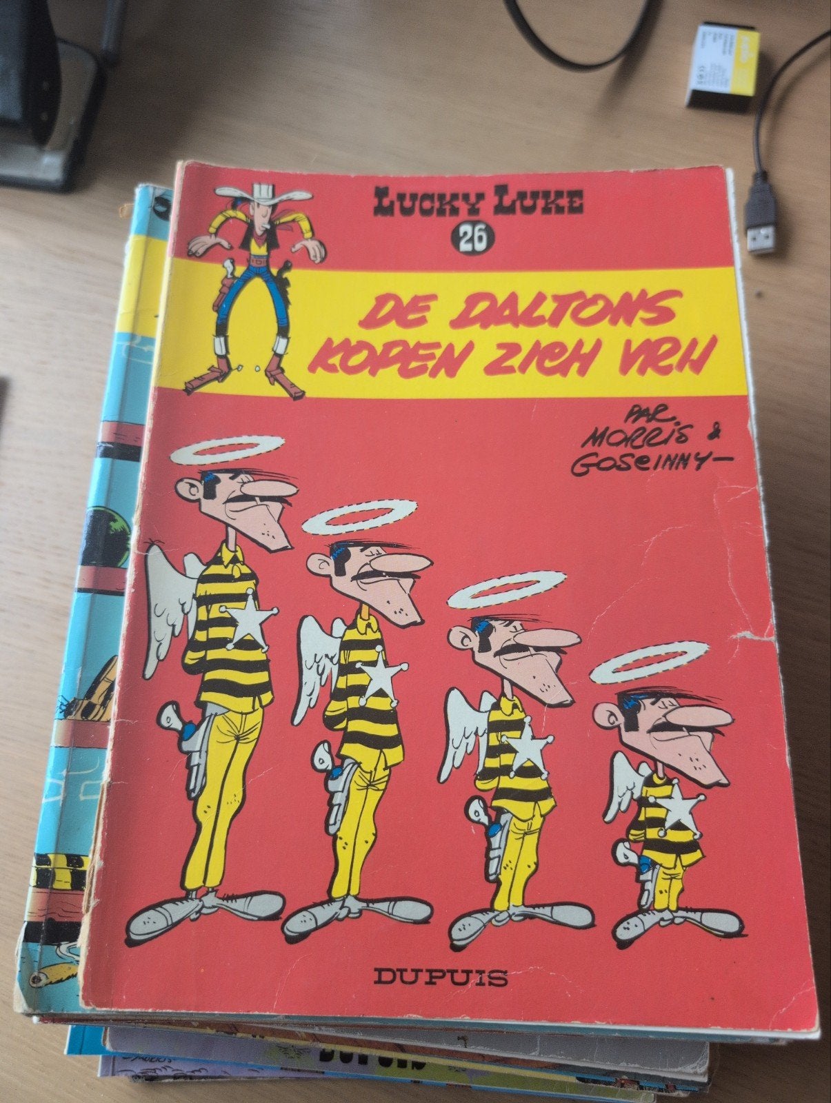 Lucky Luke 26: De Daltons Kopen Zich Vrij  Morris & Goscinny, Eén stripboek, Ophalen of Verzenden, Gelezen, Morris & Goscinny
