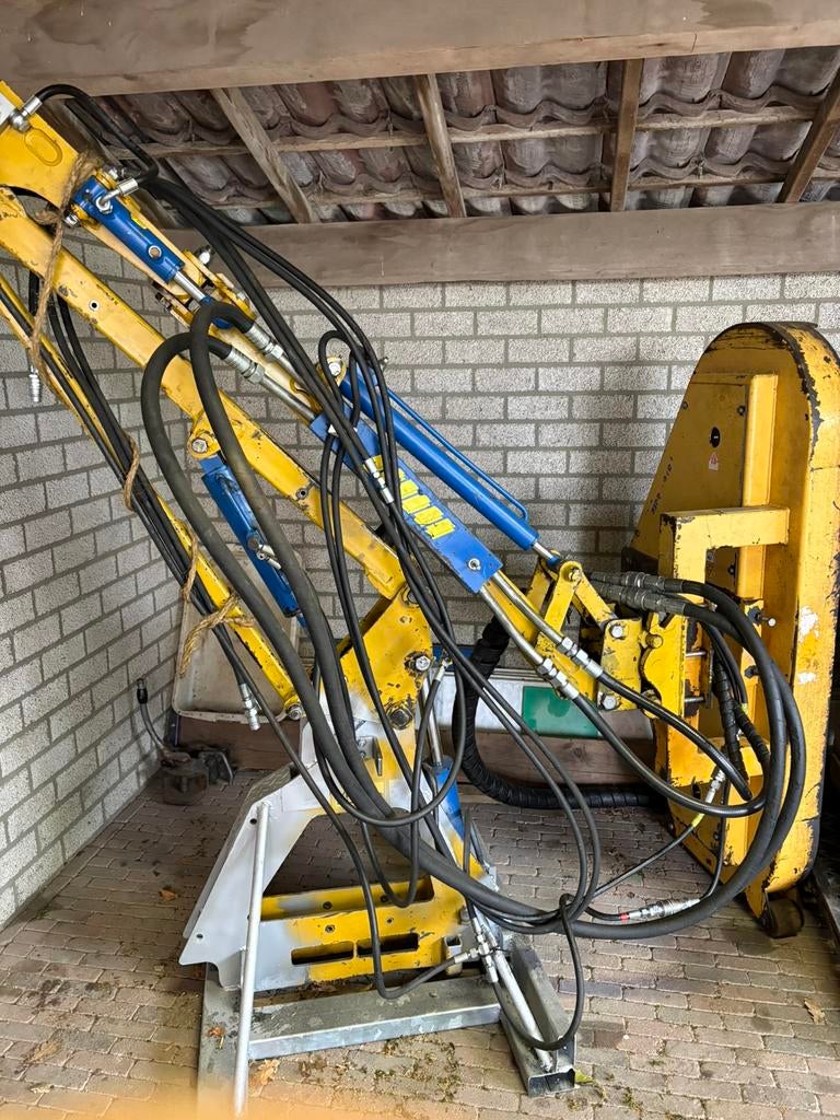 Maaiarm met hydrauliek unit Marolin, Ophalen