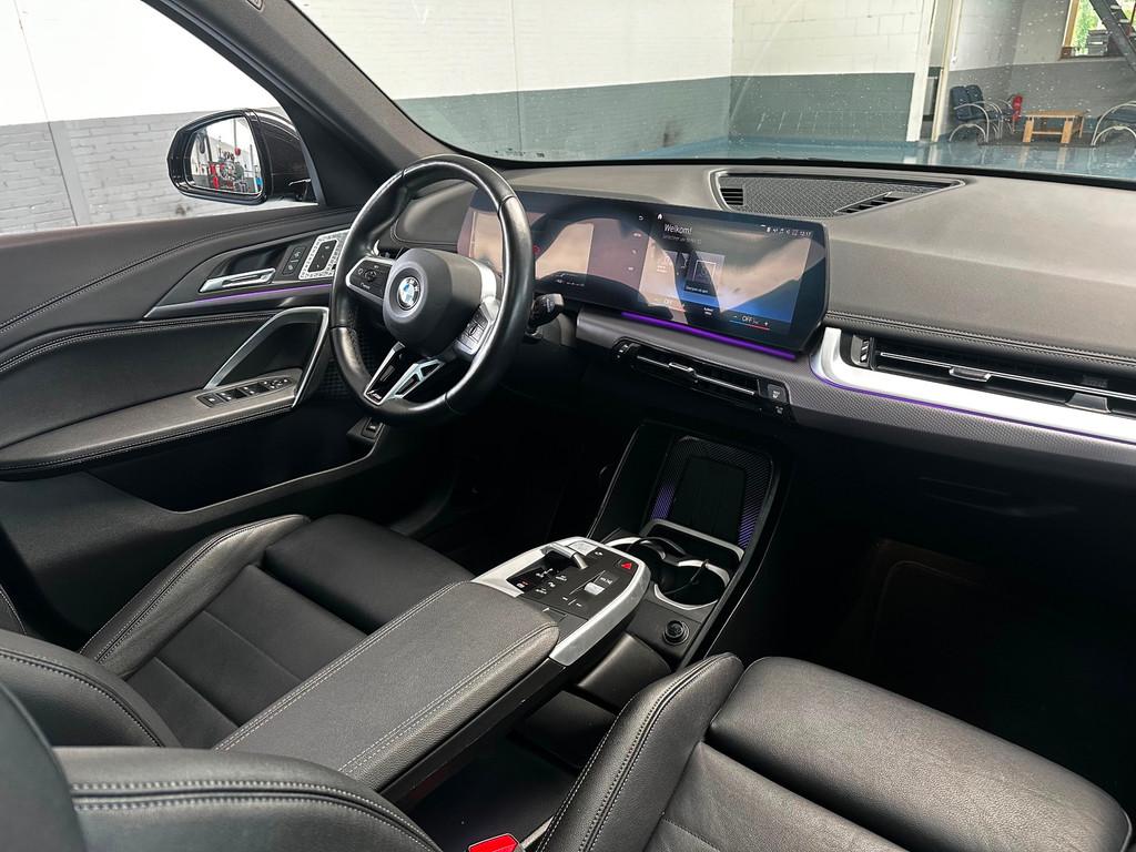 BMW X1 SDrive18i M-Pakket/Pano/Massage/elect.trekhaak/Harman, 136 pk, Gebruikt, Zwart, Leder
