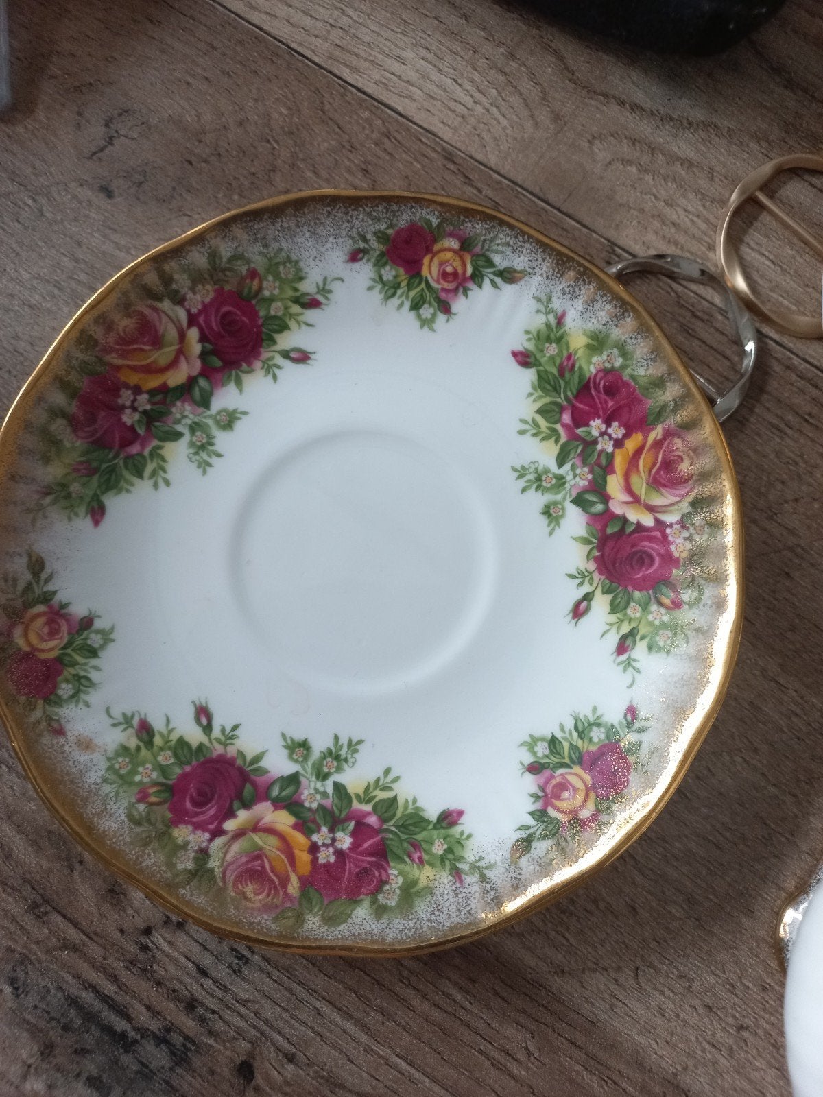 Elizabethan The Rose Thee kop en schotel, Ophalen