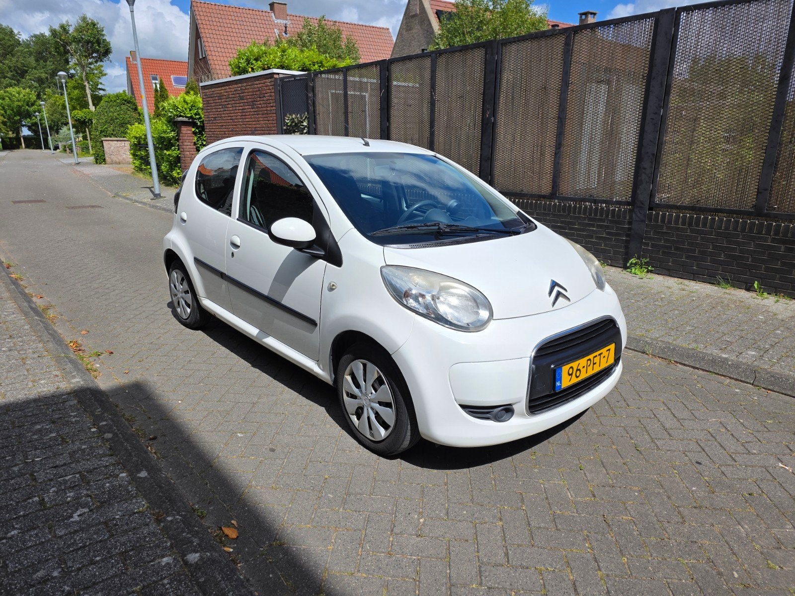 Citroën C1 1.0i 68PK 5D 2011 Wit, Auto's, Voorwielaandrijving, Euro 5, Stof, 4 stoelen