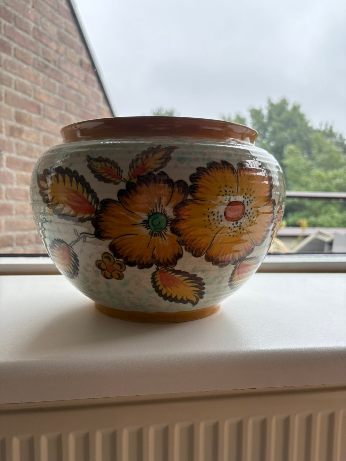 Goudse plateel bloempot, Ophalen, Gebruikt