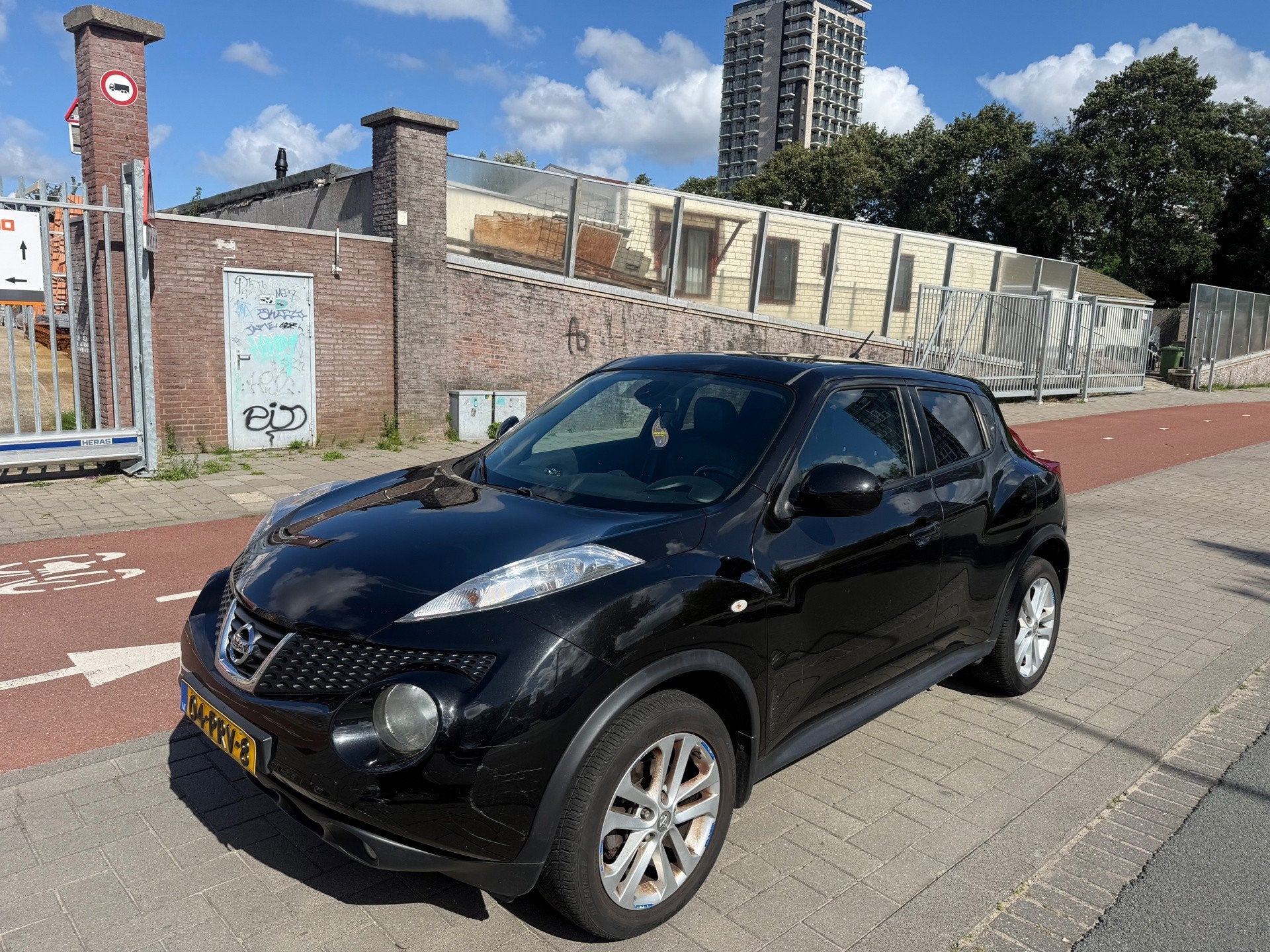 Nissan Juke 1.6 Tekna Clima Keyless Cruise Bluetooth NL Auto, Voorwielaandrijving, Euro 5, Zwart, 4 cilinders