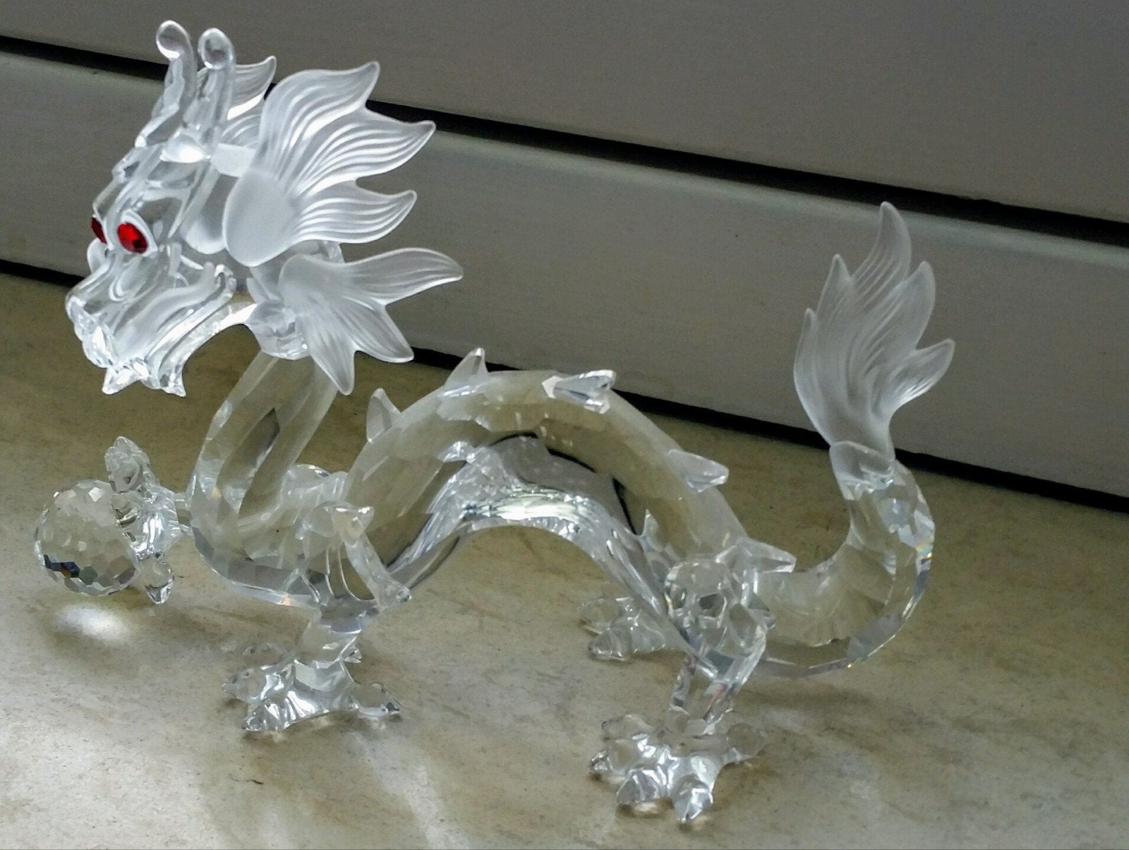 Swarovski draak jaarstuk met doos omdoos En certificaat, Ophalen of Verzenden, Zo goed als nieuw, Figuurtje