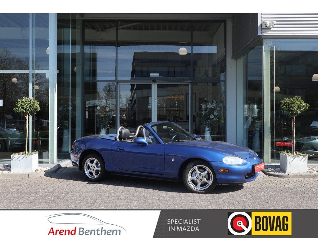 Mazda MX-5 1.8i 10th Anniversary 6 versnellingen (bj 1999), Auto's, Oldtimers, Achterwielaandrijving, Cabriolet, Blauw, 11 km/l