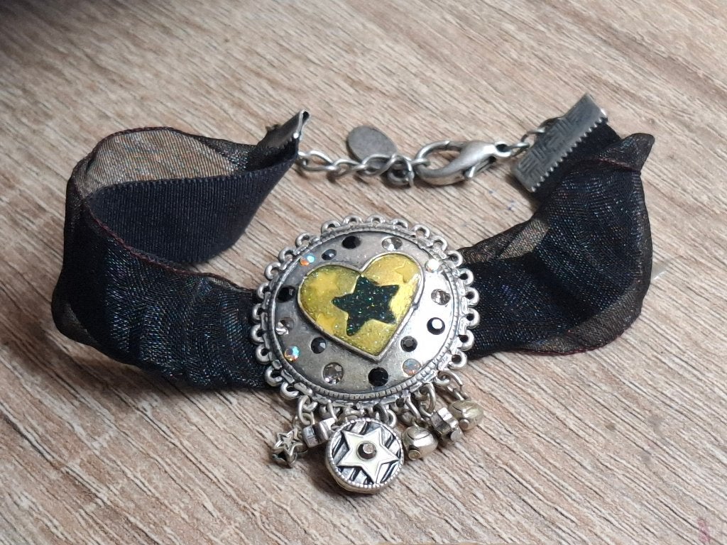 Armband, Sieraden, Tassen en Uiterlijk, Oorbellen, Gebruikt, Overige materialen, Overige kleuren, Ophalen of Verzenden