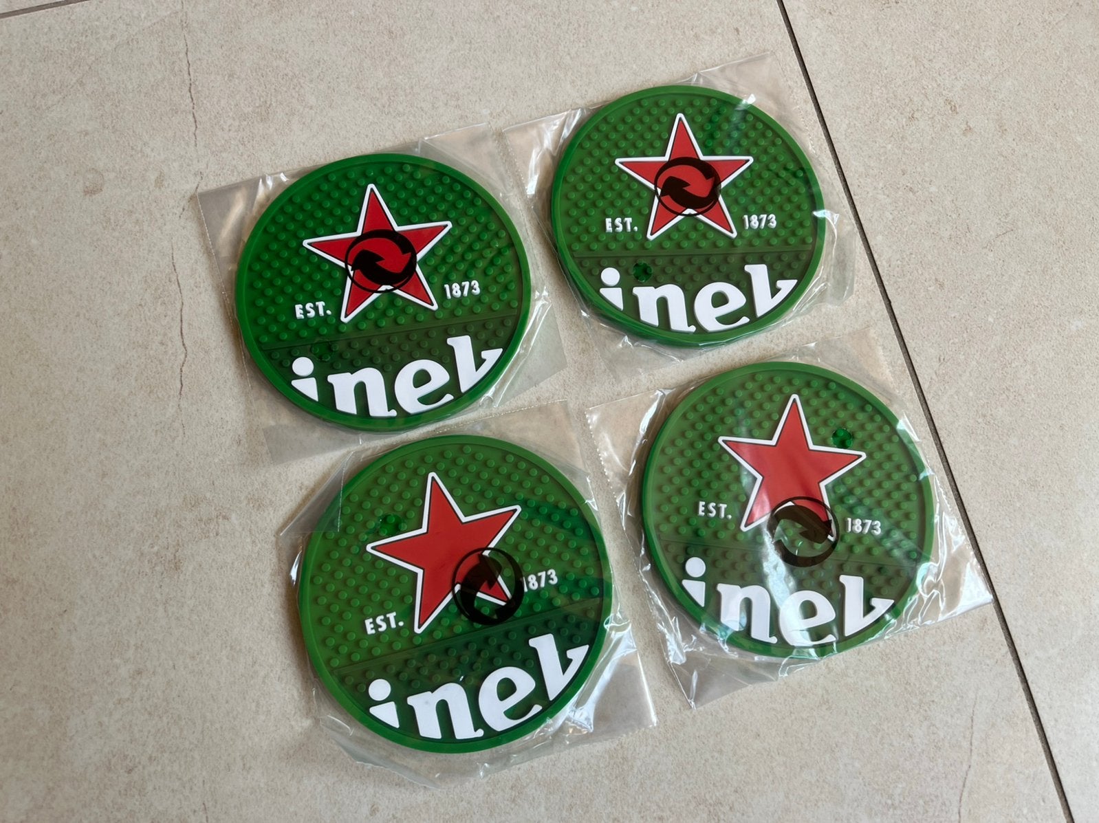Heineken set 4 rubber onderzetters NIEUW, Ophalen of Verzenden, Nieuw, Viltje(s), Heineken