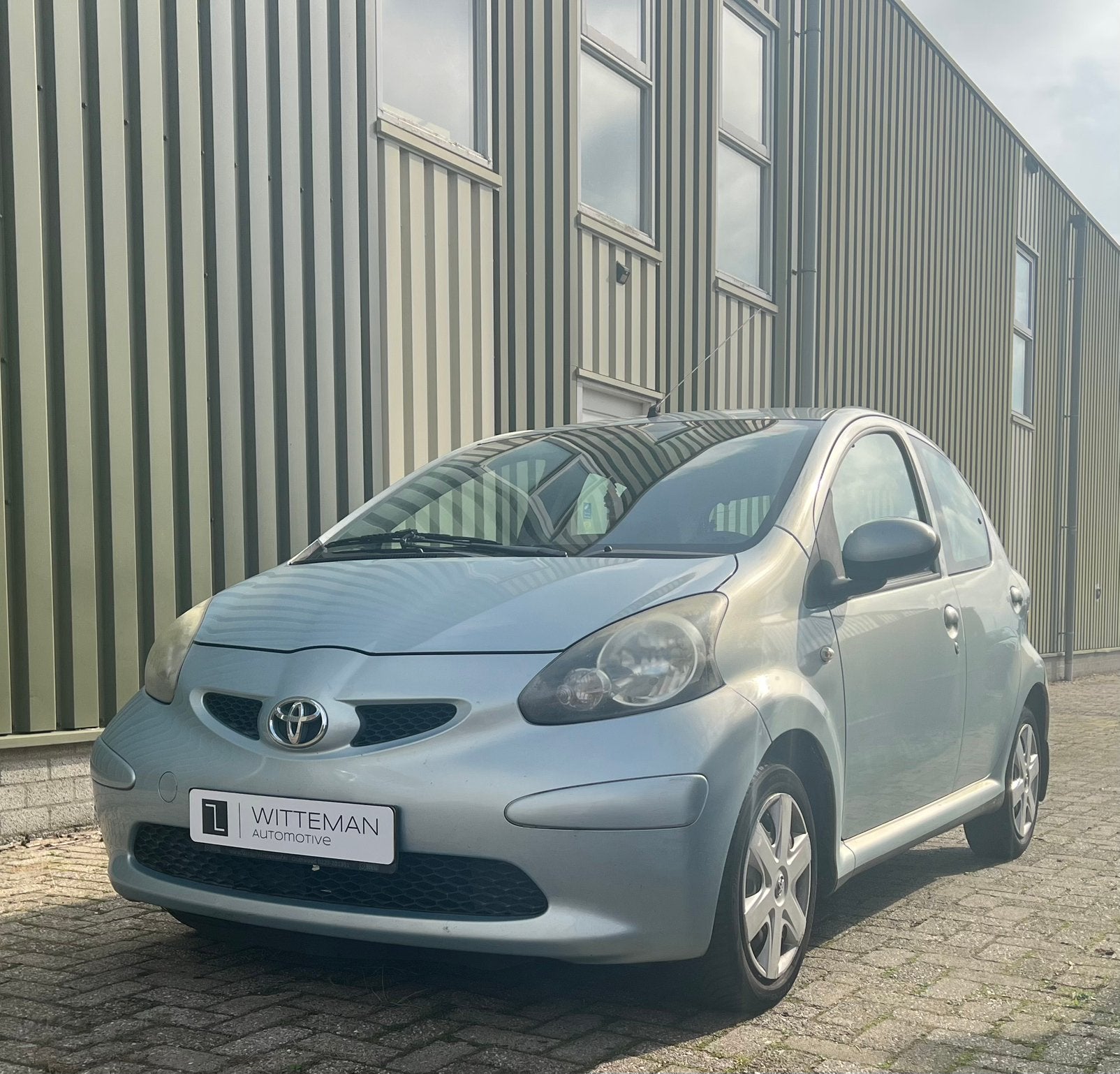 Toyota Aygo 1.0 12V Vvt-i 5DRS 2005 Blauw, Auto's, Voorwielaandrijving, Stof, 68 pk, Bedrijf