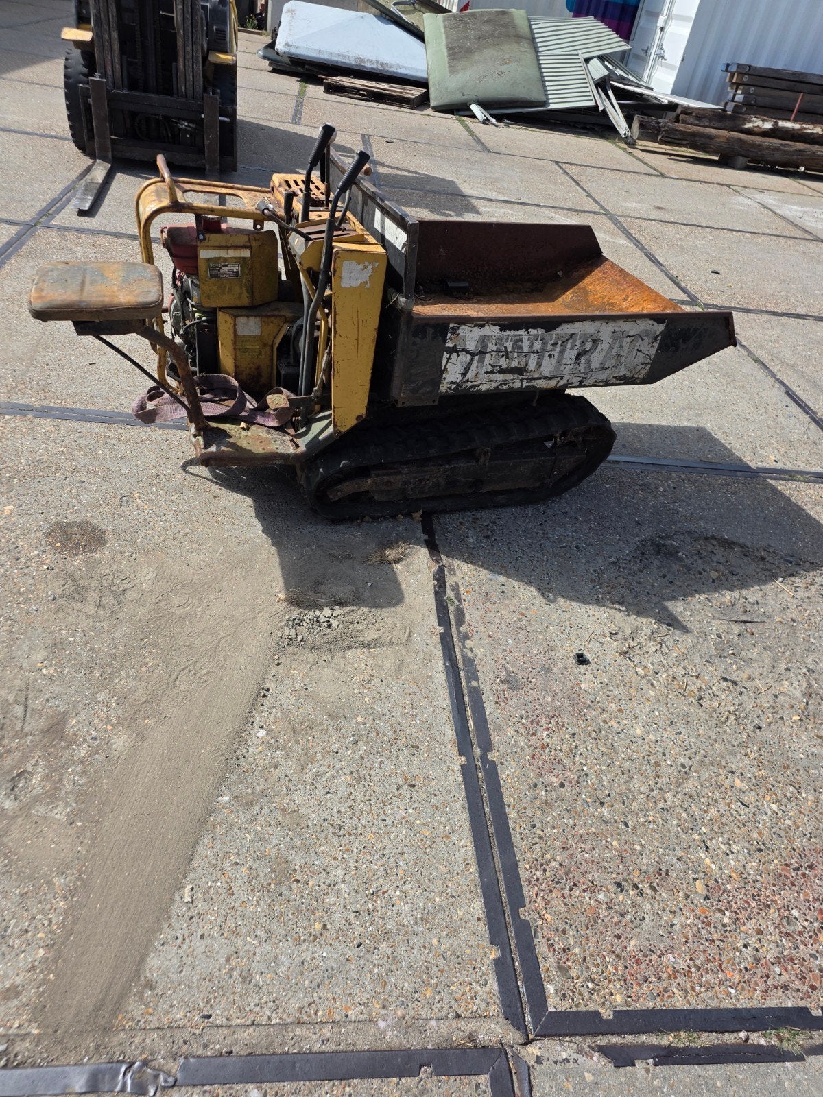 Gebruikte rupsdumper - opknapper, Ophalen