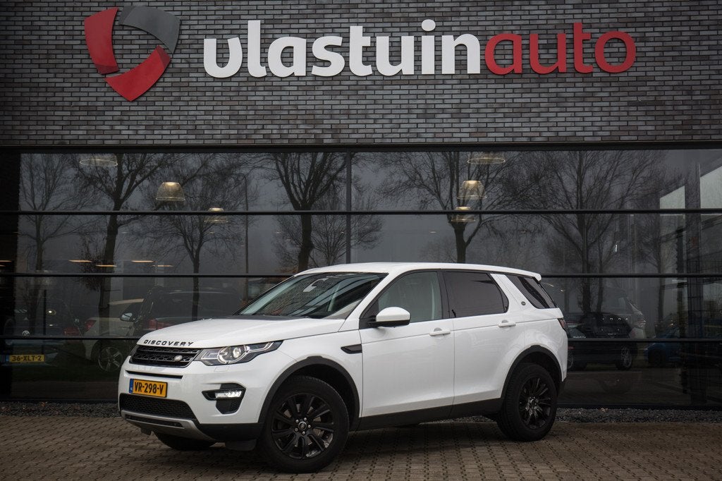 Land Rover Discovery Sport , Grijs kenteken, Leer, Achteruit, Auto's, Automaat, Euro 5, Gebruikt, Zwart
